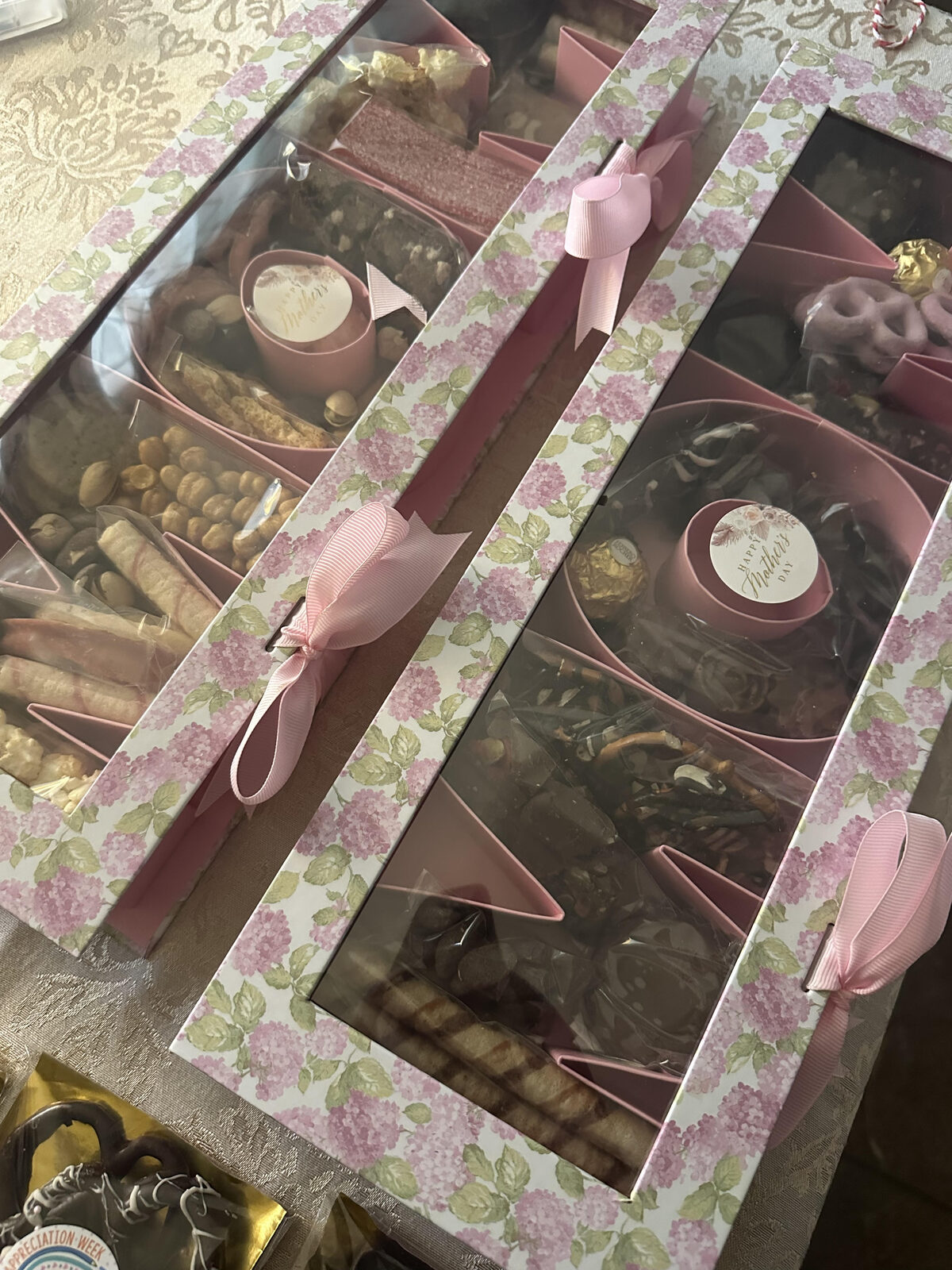 Floral gift boxes tied with ribbon